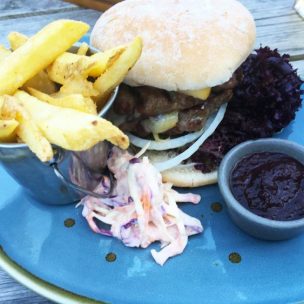 12oz double burger with chips and coleslaw at The Old Sawmill pub